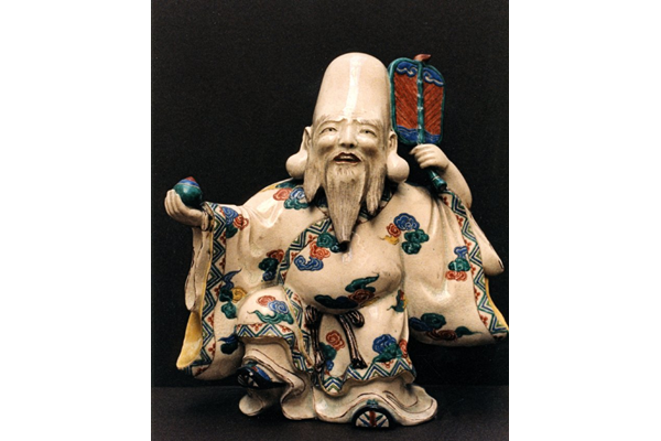 Late Edo or early Meiji period Japanese porcelain figure of the god Jurojin, representing wisdom and longevity. - 1981.202 - ©McLean Museum and Art Gallery, Greenock