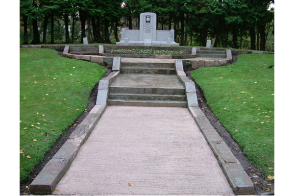 This Blitz Memorial is located at Greenock Cemetery at the main approach from South Street, Greenock.