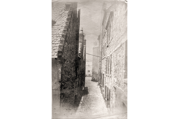 This image shows a view of Drummer's Close from Dalrymple Street, Greenock. Drummer's Close was one of the few old streets to survive the 1877 improvement. - Photographer unknown - Bromide print on paper - P4072 - © McLean Museum and Art Gallery, Greenock