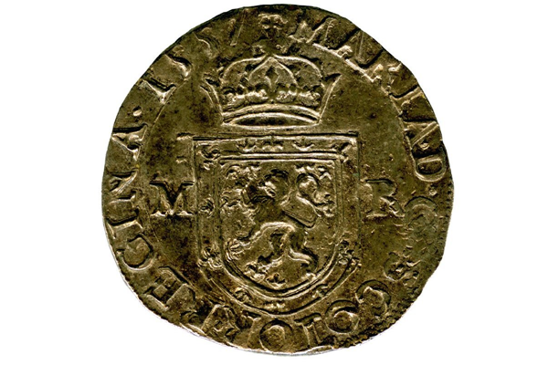 A Queen Mary Testoon coin from the Greenock Coin Hoard. The coin was valued at 5 shillings and was made of silver. This example is dated 1557 from the first period, type III. - 1978.422 © McLean Museum and Art Gallery, Greenock.