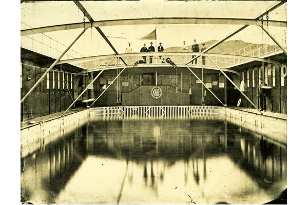 The Clyde Floating Swimming Bath Co. used a barge moored off Battery Park, Greenock to provide a bathing pool with attendants. It was unsuccessful and folded in the early 1880s. - Bromide print on paper - c 1880 - P4103 - © McLean Museum and Art Gallery, Greenock.