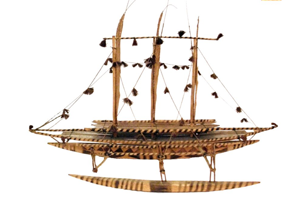 A model of a Niuginian lakatoi in wood with three sails, hull and outrigger hull, made with two decks. The model was made by a Papuan around 1950.  - 2010.10 © McLean Museum and Art Gallery, Greenock.