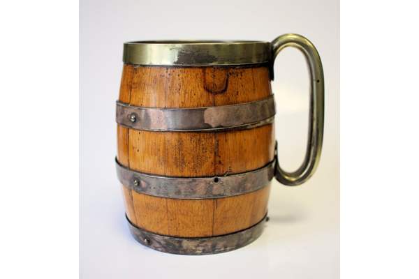 The tankard was used when Loch Thom become the reservoir for the Greenock water supply, and took the first water out of it at the opening. The wooden part of the tankard was made by Drummond, a local cooperage firm. - 2015.13 - © McLean Museum and Art Gallery, Greenock