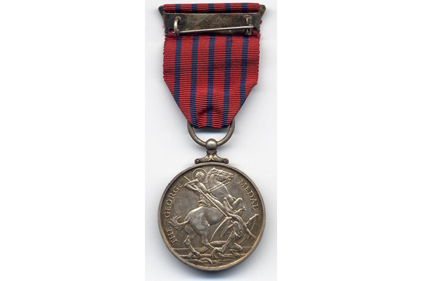 This George Medal was awarded to William Neill (d 1942) of Greenock Fire Station for his heroic action during the Greenock blitz on the night of the 7th-8th May 1941. - 2000.41 - © McLean Museum and Art Gallery, Greenock