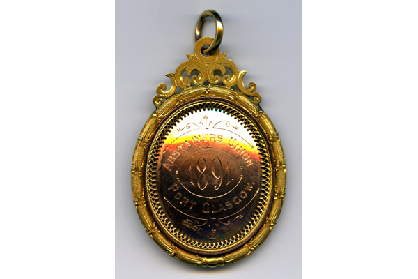 Gold medal awarded by the Abstainer's Union, Port Glasgow to Robert Thomson (d 1940) in 1891 in the competition for solo vocalist. - 2009.66 - © McLean Museum and Art Gallery, Greenock