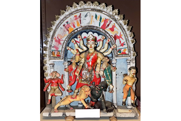 19th sculpture from Kolkata, India of the goddess Durga slaying the demon Mahishasura. Made of clay, paint, wood and metal foil. - 1981.1241 - © McLean Museum and Art Gallery, Greenock