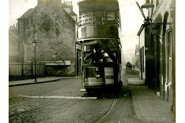 The corner of Scarlow Street and Fore Street, Port Glasgow looking West, showing a double-decker tramcar. - 2009.98.18 - © McLean Museum and Art Gallery, Greenock