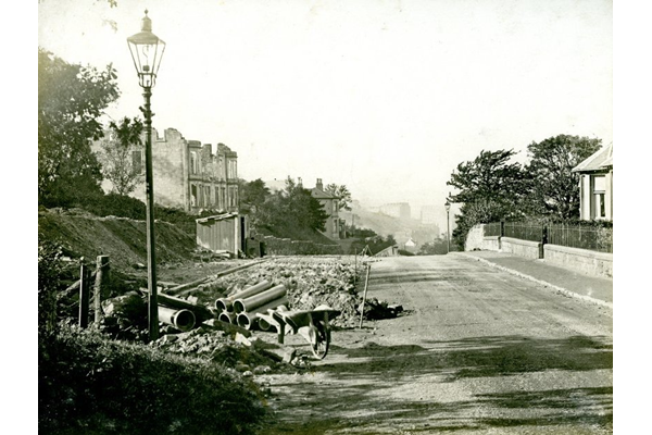 The top of Clune Brae, Port Glasgow looking West showing road widening - 2009.98.22 - © McLean Museum and Art Gallery, Greenock