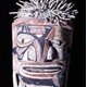 Malagan totem head from New Ireland decorated with various pigments, including lime, and the eyes made from Turbo petholatus opercula. Late 19th century - 1981.1437 © McLean Museum and Art Gallery, Greenock.