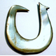 A 19th century shell fish hook from Oceania, probably Tahiti, made from mother-of-pearl. - 1981.1352 © McLean Museum and Art Gallery, Greenock.