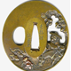 An eighteenth century Japanese swordguard or tsuba. Its is made of yellow bronze and is decorated with a scene sowing an elderly figure following a bullock being led across a river by an oni. Signed by Hiroyasu. - 1981.65 - © McLean Museum and Art Gallery, Greenock