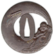 A eighteenth century Japanese swordguard or tsuba. The design shows Hotei Osho with his treasure bag in relief casting and openwork. Decorated with gold and silver inlays. Signed: Tomomitsu. - 1981.125 - © McLean Museum and Art Gallery, Greenock