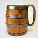 The tankard was used when Loch Thom become the reservoir for the Greenock water supply, and took the first water out of it at the opening. The wooden part of the tankard was made by Drummond, a local cooperage firm. - 2015.13 - © McLean Museum and Art Gallery, Greenock