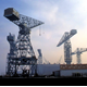 Cranes at the Scott Lithgow shipyard at Cartsburn, Greenock prior to demolition in 1987. - 2005.8.35 - © McLean Museum and Art Gallery, Greenock