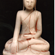 A carved marble seated figure of a Shakyamuni Buddha, probably 19th century, from Myanmar. The figure is seated in vajrasana, his right hand in bhumisparshamudra. - 1981.1244 - © McLean Museum and Art Gallery, Greenock