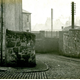 Chapel Lane, Port Glasgow, South of the railway bridge with a cobbled lane and telegraph poles. - 2009.98.11 - © McLean Museum and Art Gallery, Greenock