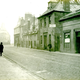 Shops and pub at Scarlow Street, Port Glasgow with tram lines visible. - 2009.98.41 - © McLean Museum and Art Gallery, Greenock