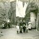 Families in the court at 42 King Street, Port Glasgow - 2009.98.44 - © McLean Museum and Art Gallery, Greenock