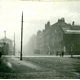 Port Glasgow Road looking East showing the  Greenock - Port Glasgow boundary. The boundary is shown as a white line. - 2009.98.4 - © McLean Museum and Art Gallery, Greenock